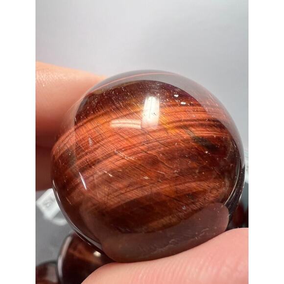 Red tigers eye sphere - Picture 11 of 11